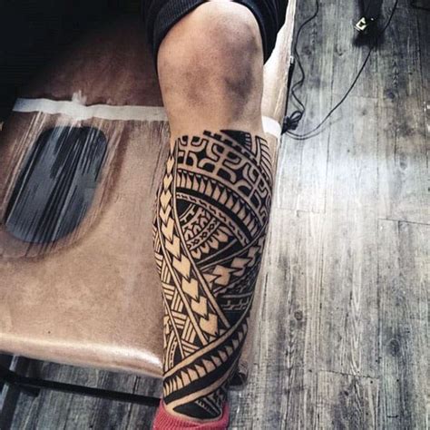 tribal tattoo for legs|polynesian leg tattoos for men.